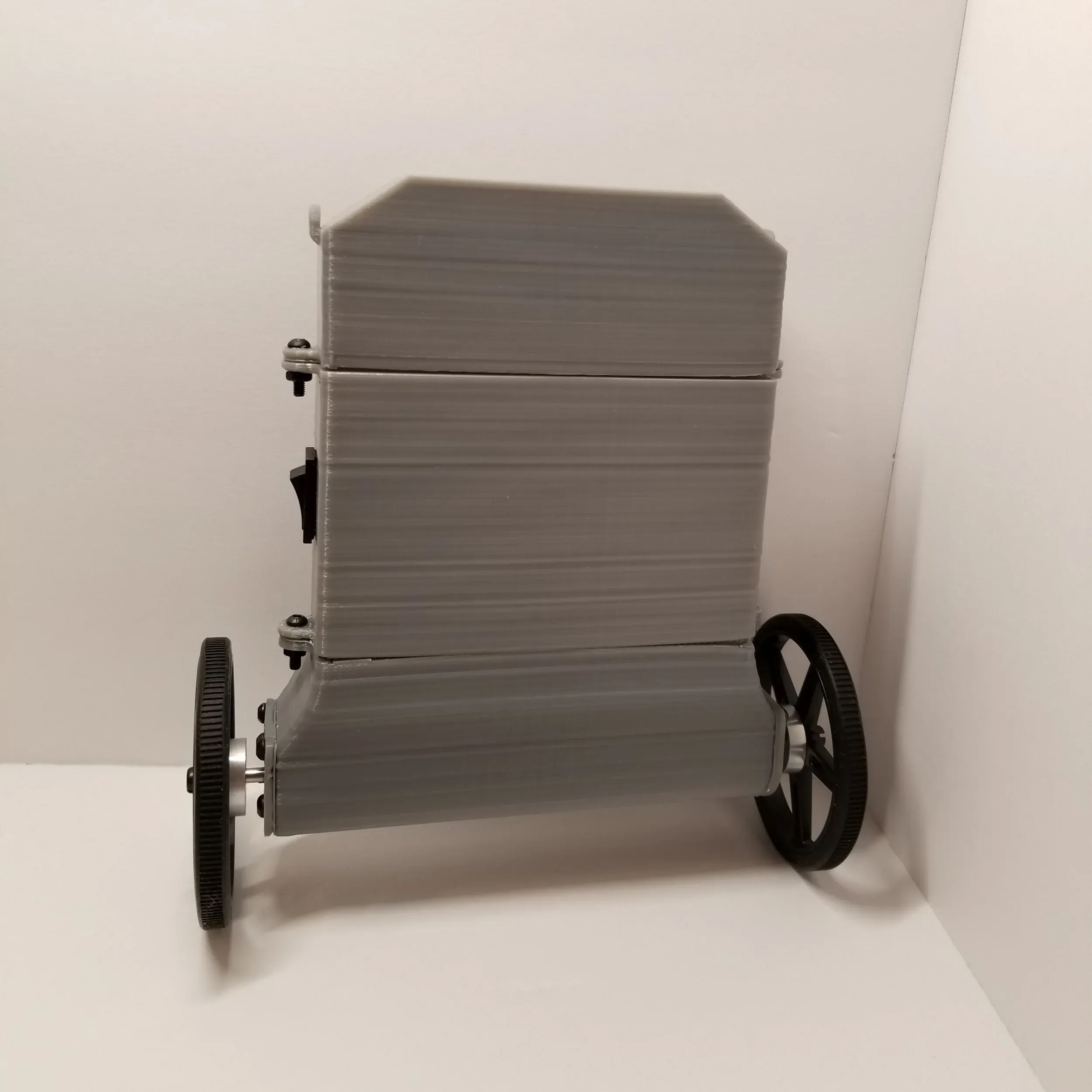 Two-wheeled self-balancing robot with a gray 3D-printed enclosure.